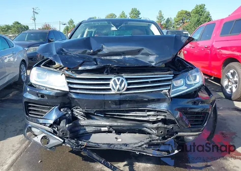 2015 Volkswagen Touareg Tdi Lux z USA, uszkodzony, nr VIN WVGEP9BP5FD006664